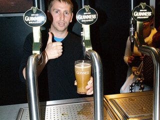 Pouring the Perfect Pint of Guinness at the Guinness Storehouse