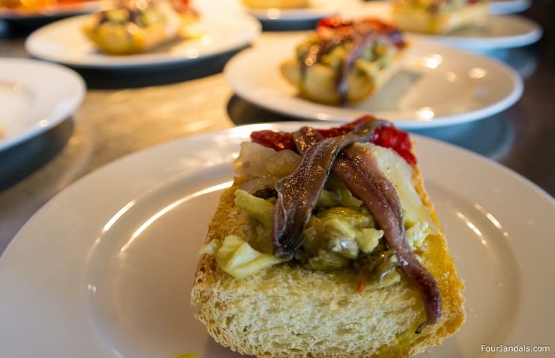 Christmas in the Balearics Artichokes with fish, piquillo peppers
