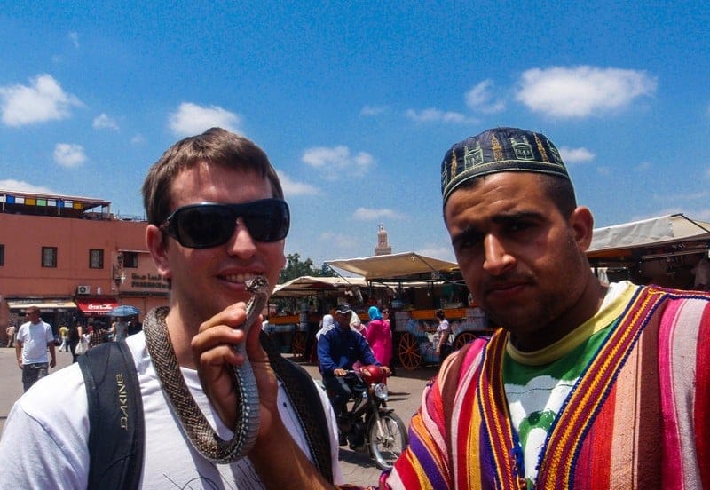 Marrakech Snake Charmer, Morocco, Cole, Couples Travel Tips