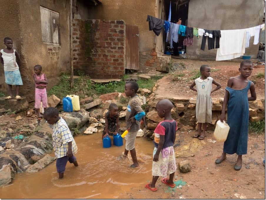 Drinking water in Bwaise Slum