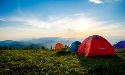 photo of pitched dome tents overlooking mountain ranges 1687845