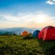 photo of pitched dome tents overlooking mountain ranges 1687845