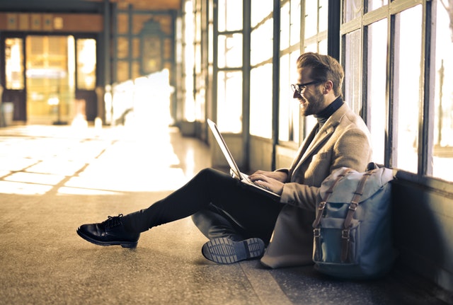 man wearing gray blazer 838413