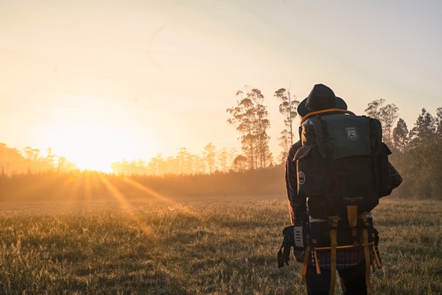 man in black backpack during golden hour 1230302