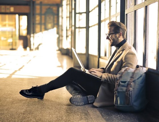 man wearing gray blazer 838413