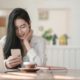 shallow focus photo of woman using smartphone 3803219