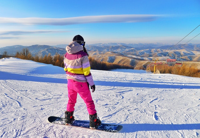 person snowboarding on field 1705667