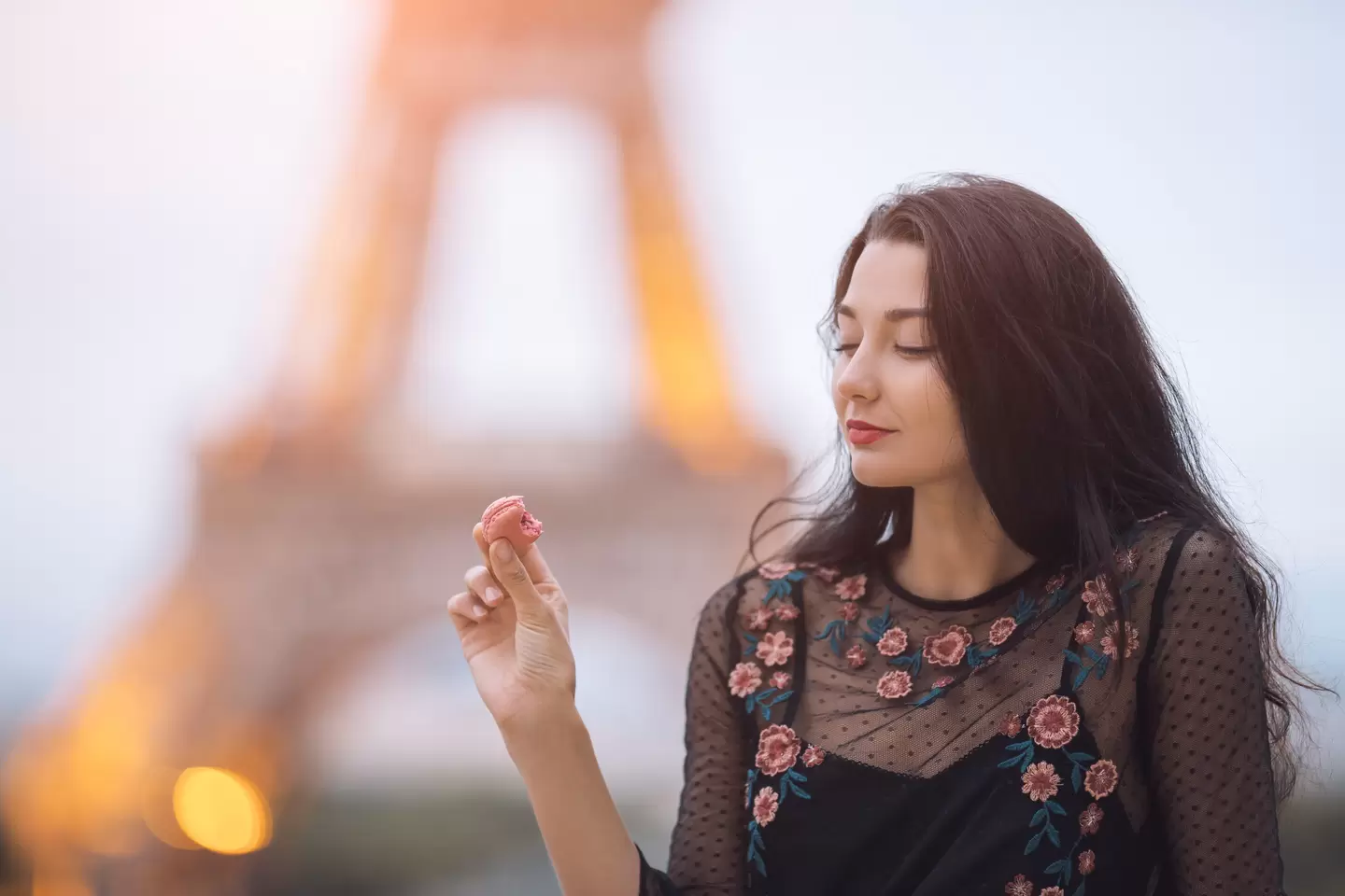 paris woman smiling eating the french pastry macar 2021 08 28 23 14 41 utc 2