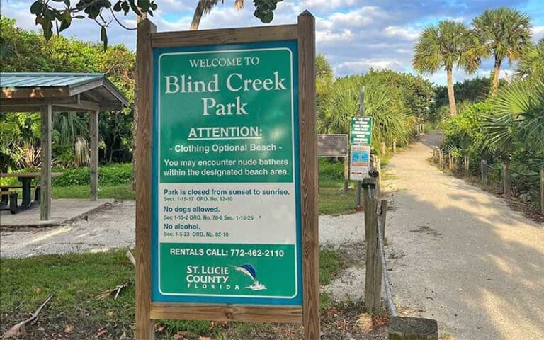 sign beside pathway with pavilion at blind creek beach fort pierce 768x480 1